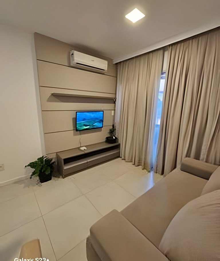 Apto - Pertinho do mar com piscina e garagem